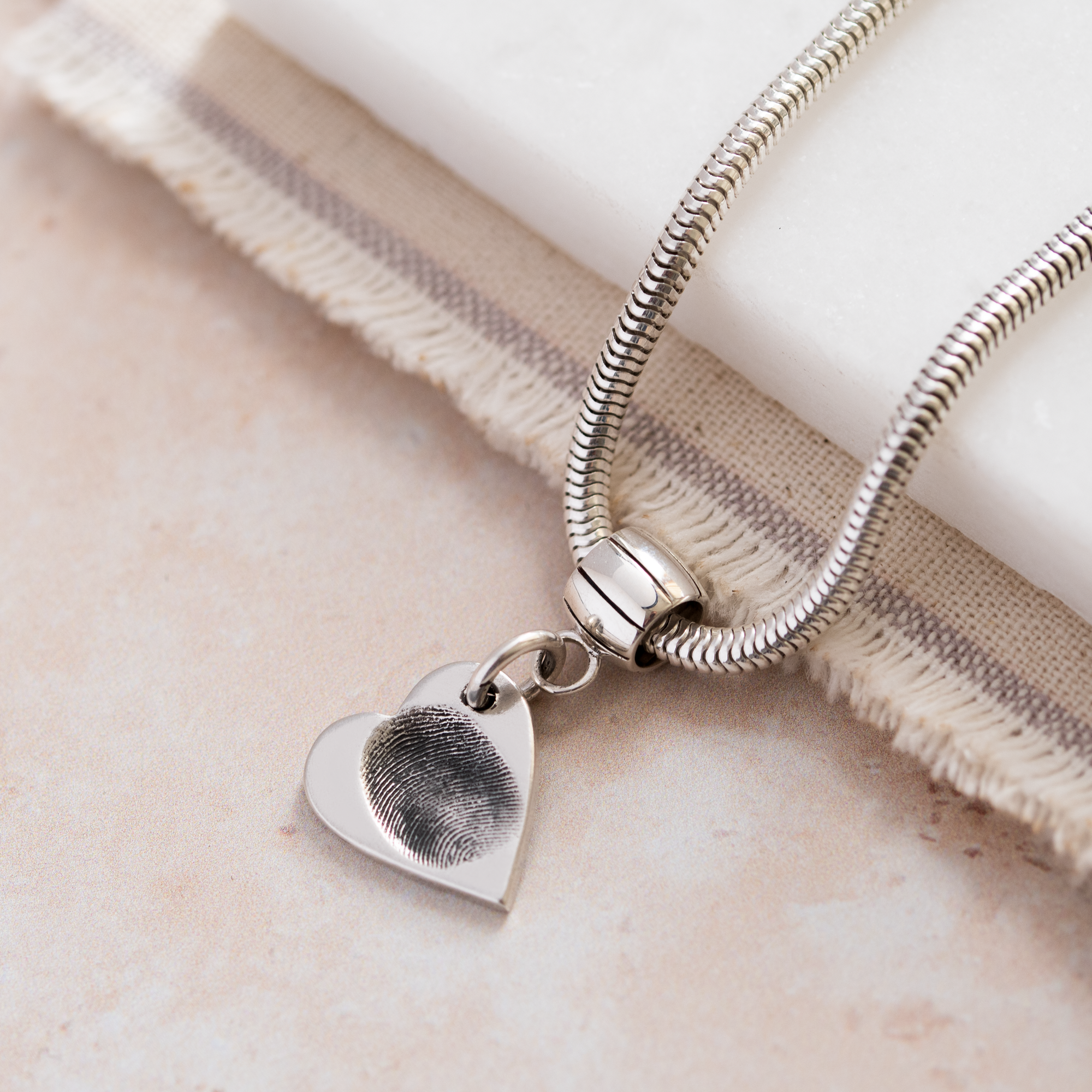 heart shaped fingerprint pendant on snake chain